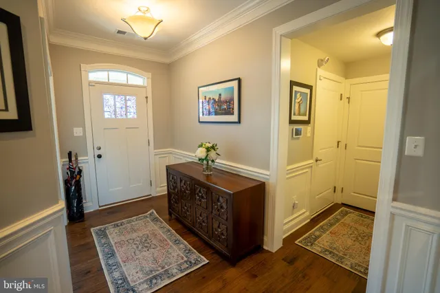 a view of a hallway with bathroom