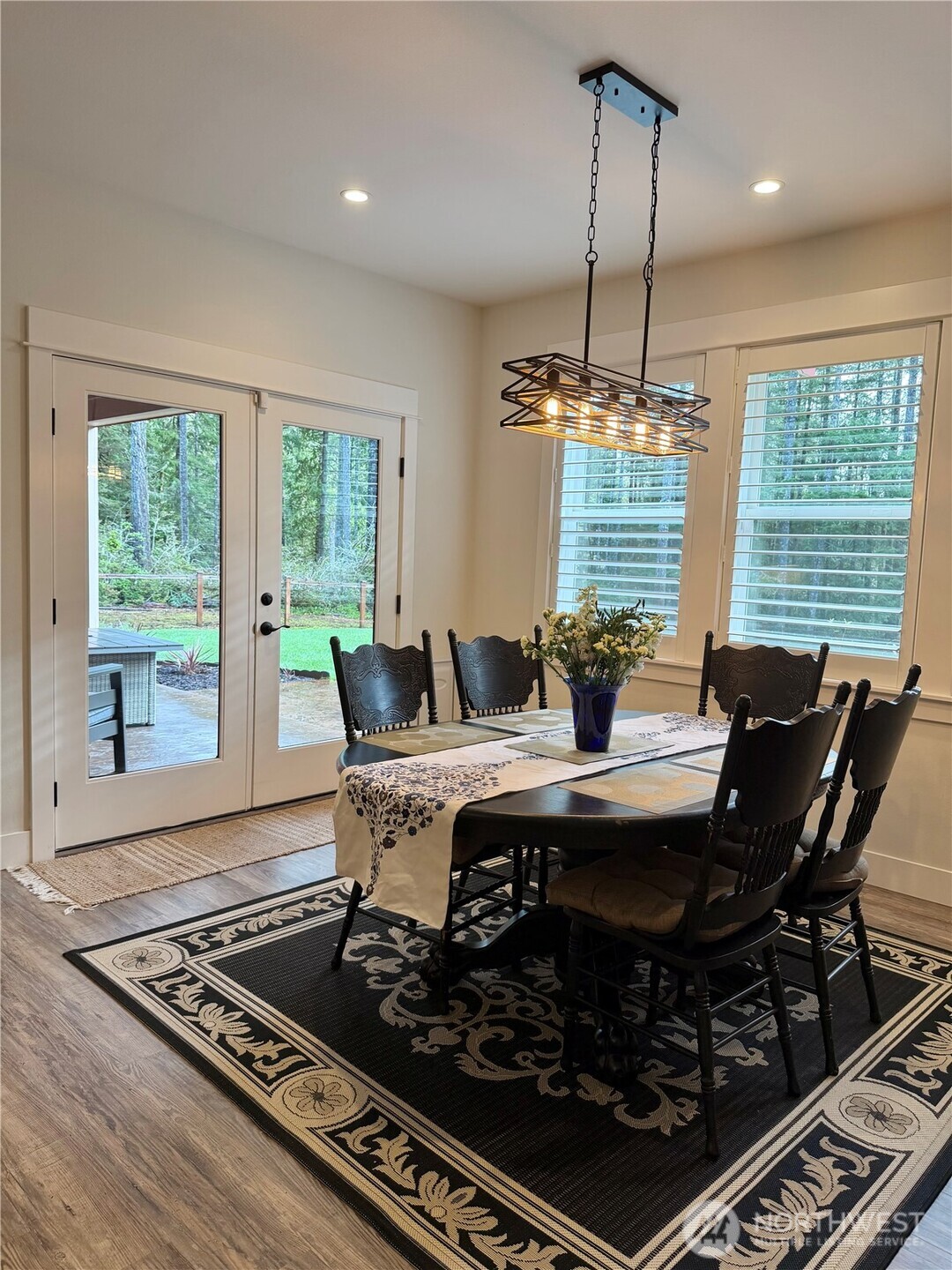 18349 Northwest Stavis Bay Road Seabeck, WA 98380 - Photo 19 of 40 a view of a dining room with furniture window and outside view