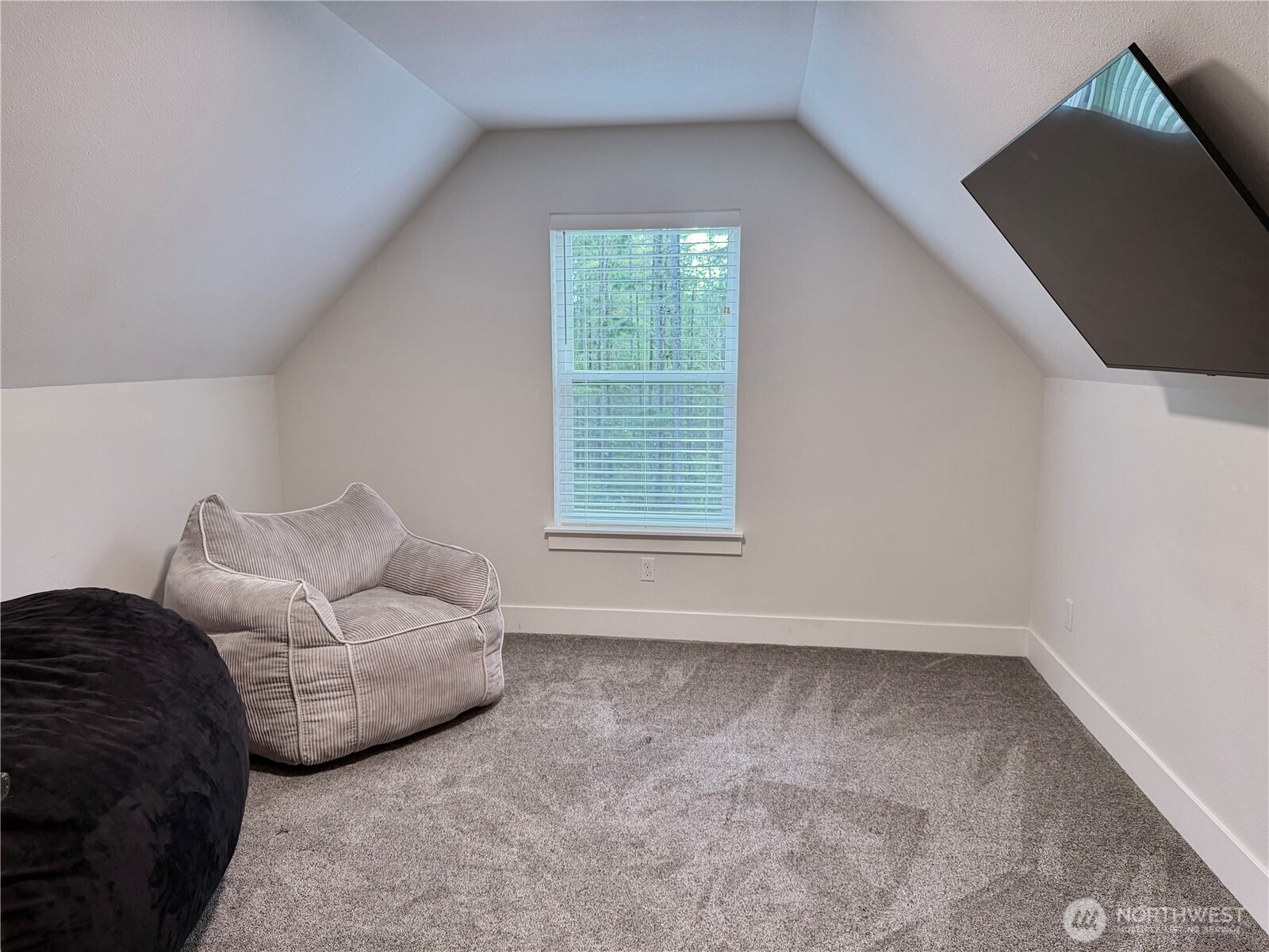 18349 Northwest Stavis Bay Road Seabeck, WA 98380 - Photo 34 of 40 a living room with furniture and a window