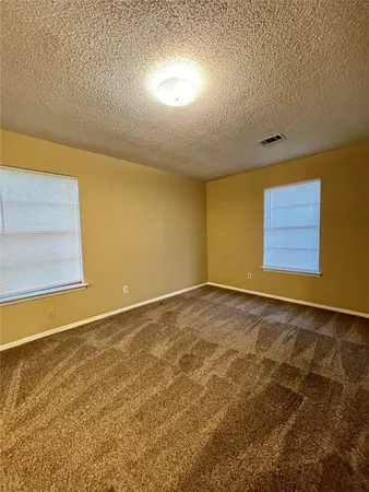 an empty room with entrance and door