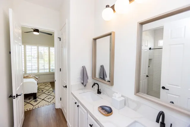 a view of a swimming pool with furniture