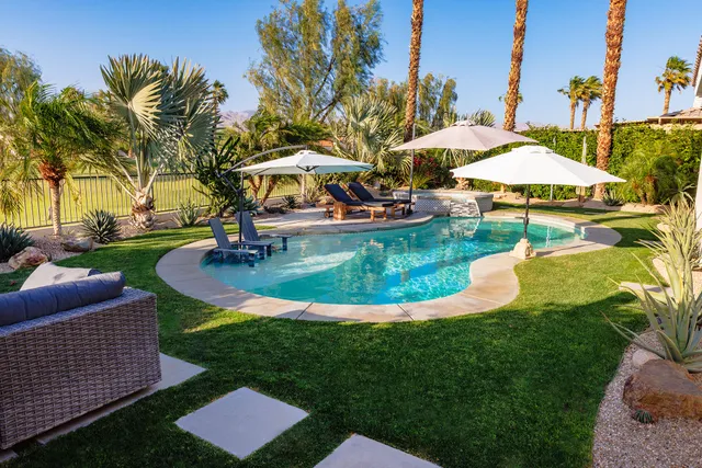 a view of a living room and dining room