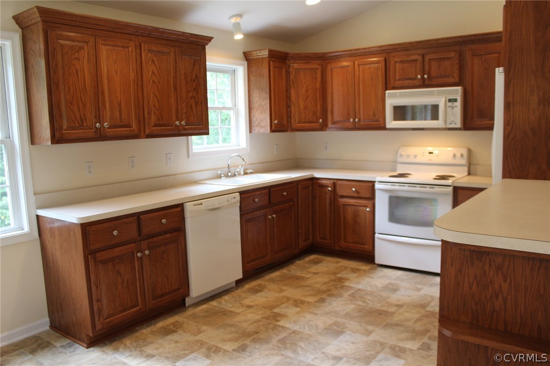 1579 New Store Road Dillwyn, VA 23936 - Photo 14 of 22 a kitchen with a sink stove top oven and cabinets