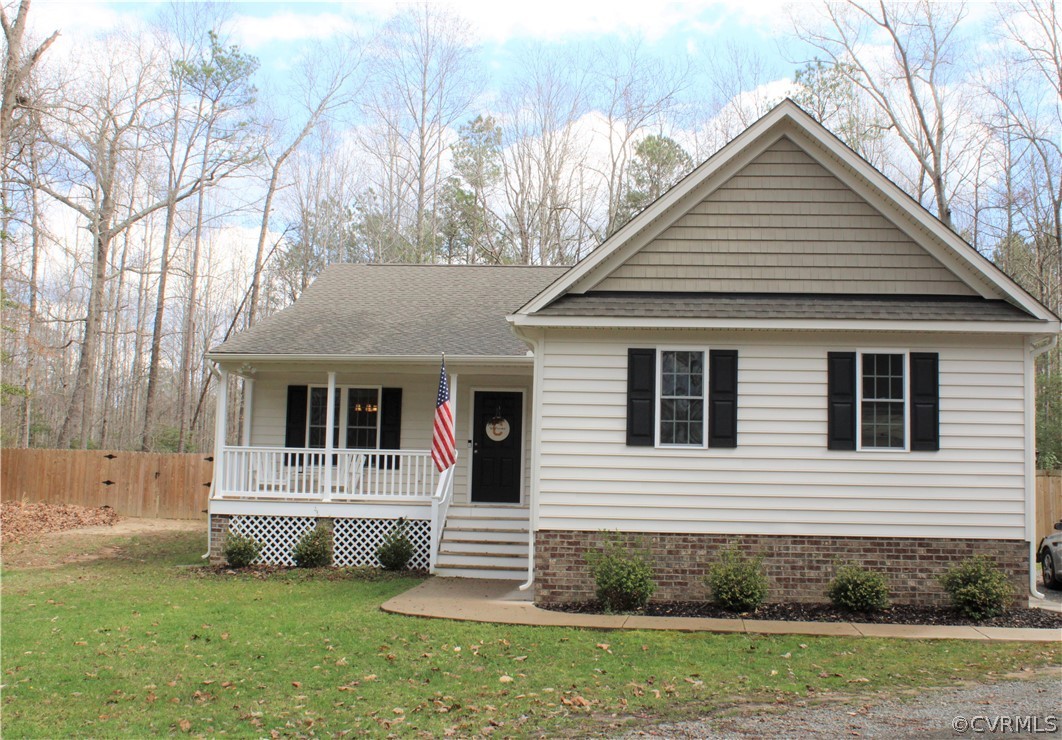 5311 North Courthouse Road Providence Forge, VA 23140 - Photo 1 of 49 a front view of a house with a yard