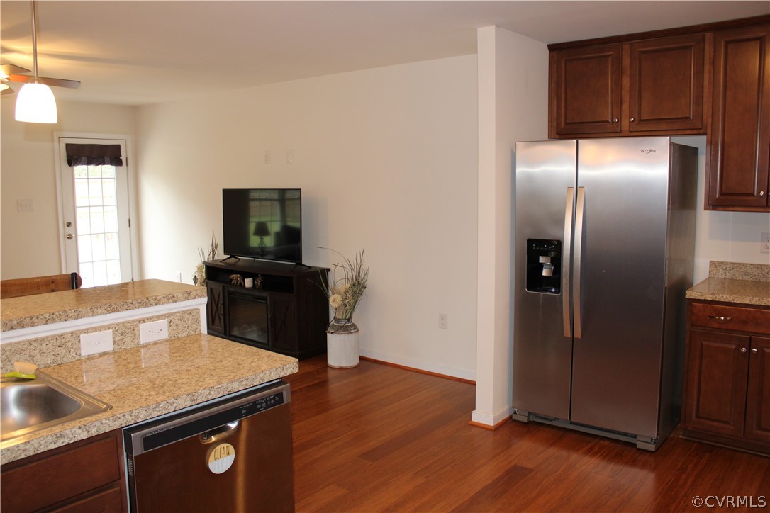 5311 North Courthouse Road Providence Forge, VA 23140 - Photo 24 of 49 a kitchen with a refrigerator and wooden floor