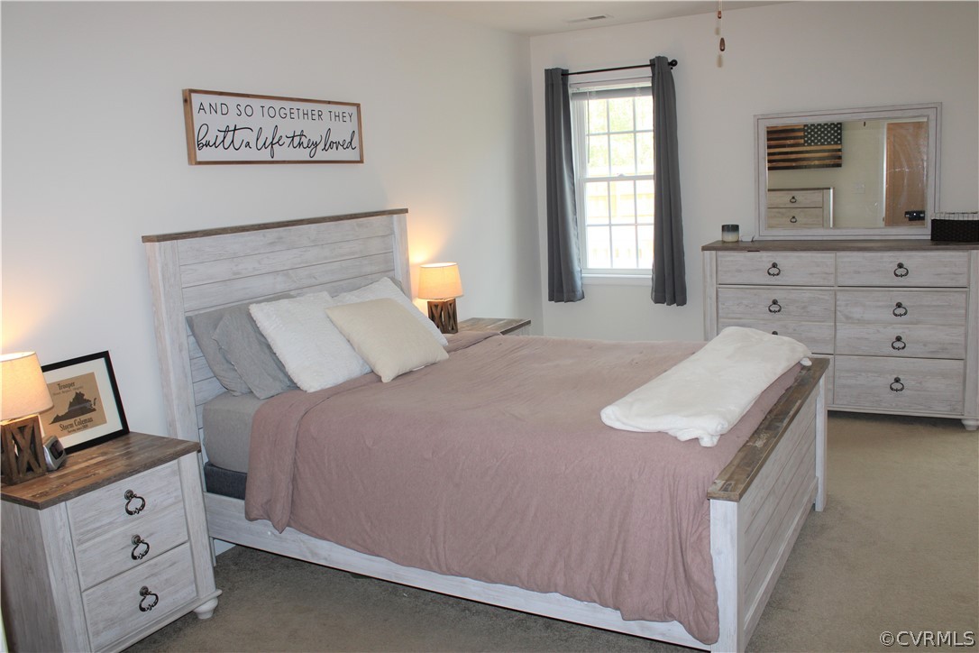 5311 North Courthouse Road Providence Forge, VA 23140 - Photo 38 of 49 a bedroom with a bed and a window