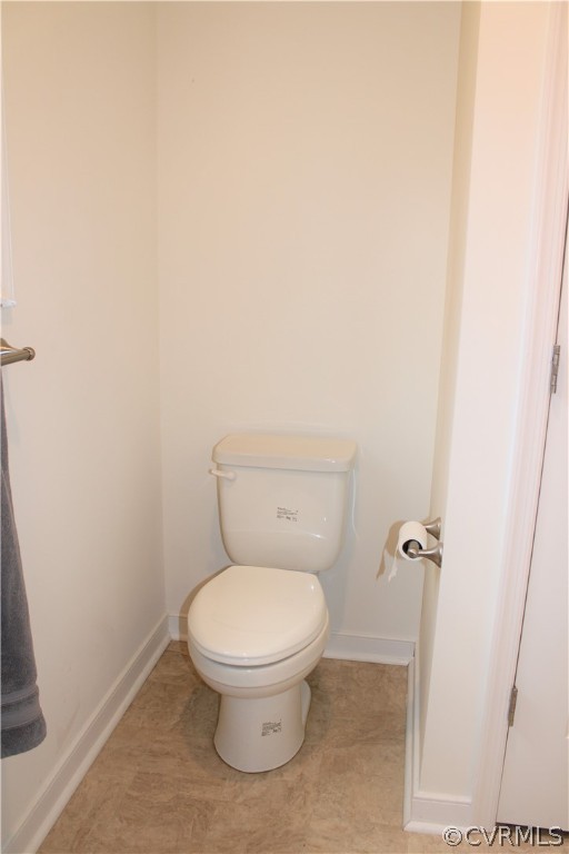 5311 North Courthouse Road Providence Forge, VA 23140 - Photo 44 of 49 a white toilet sitting next to a white sink