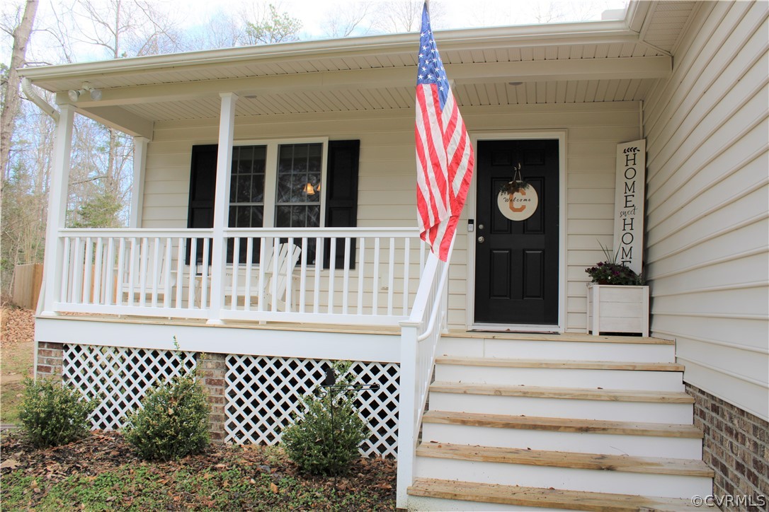 5311 North Courthouse Road Providence Forge, VA 23140 - Photo 5 of 49 a front view of a house with a large window