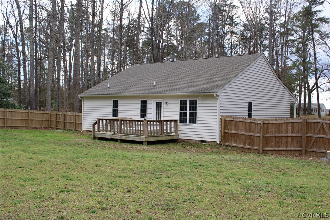 5311 North Courthouse Road Providence Forge, VA 23140 - Photo 8 of 49 a front view of a house with a garden and yard
