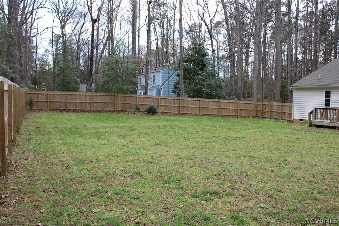 5311 North Courthouse Road Providence Forge, VA 23140 - Photo 9 of 49 a view of a backyard with large trees