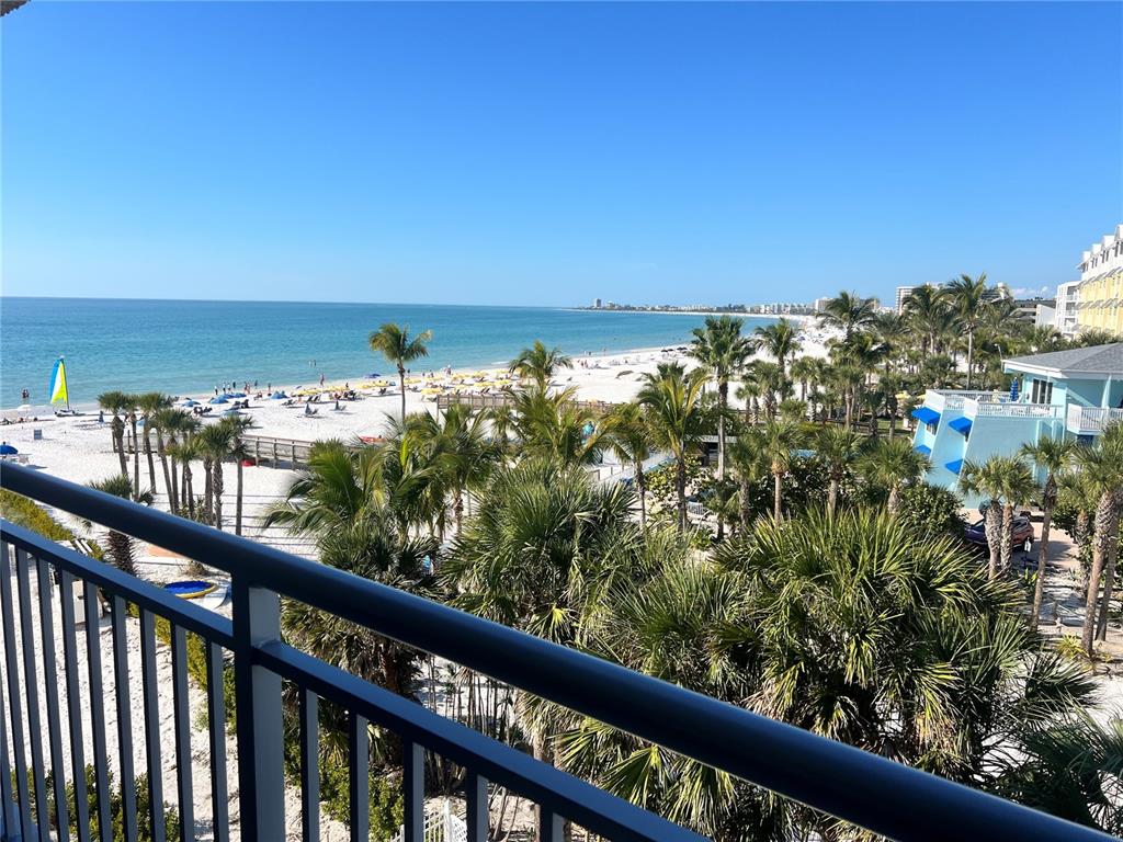 1001 Point Of Rocks Road, Unit 512 Sarasota, FL 34242 - Photo 10 of 44 a view of a city skyline from a balcony