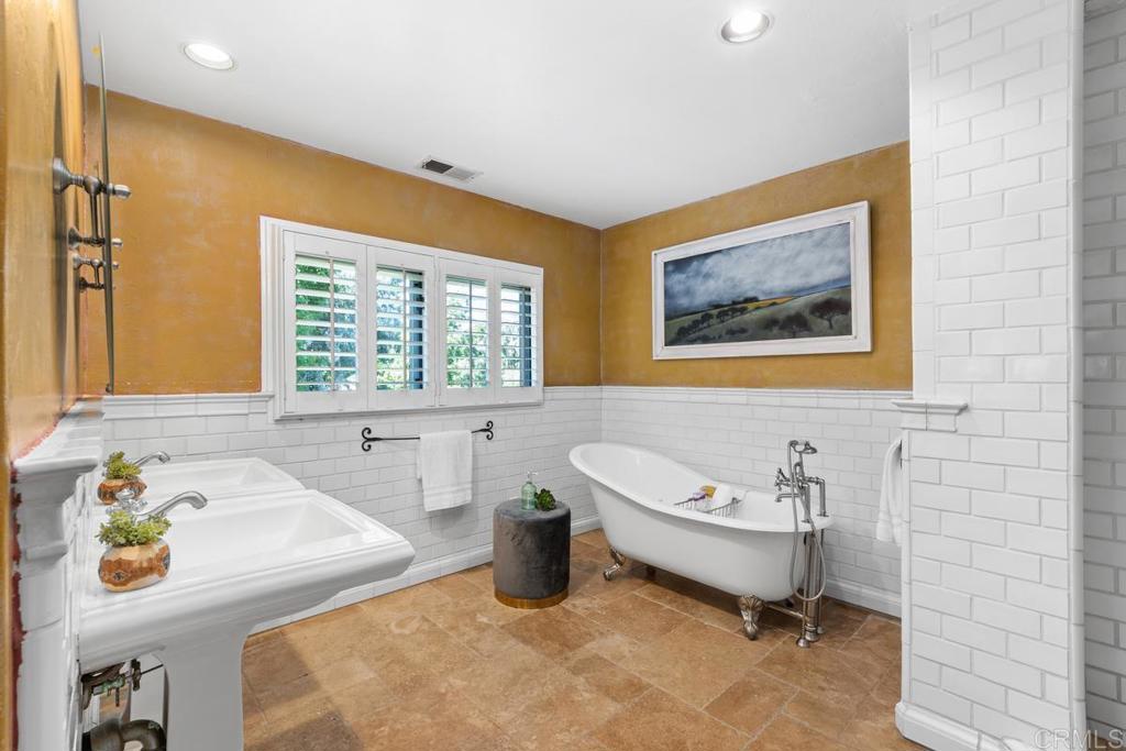 455 Cole Ranch Road Encinitas, CA 92024 - Photo 18 of 43 a bathroom with a sink and a bathtub