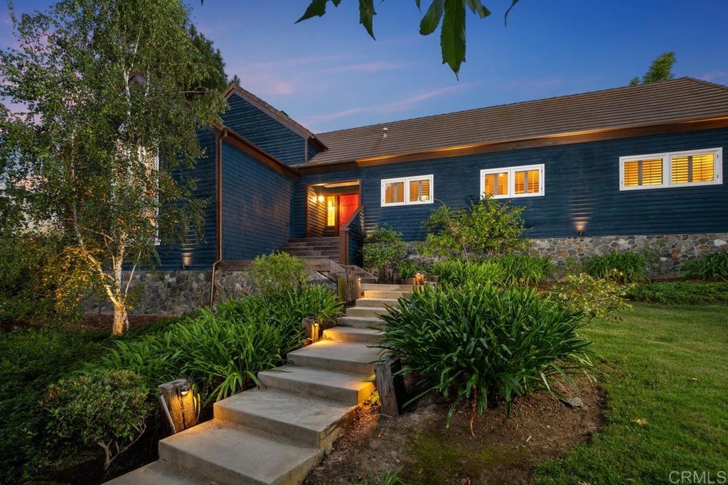 455 Cole Ranch Road Encinitas, CA 92024 - Photo 5 of 43 a front view of a house with a yard