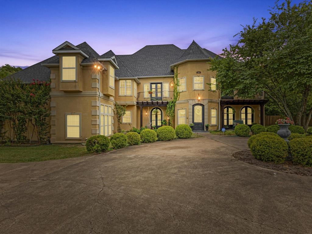 1514 New Market Road Mesquite, TX 75149 - Photo 1 of 30 a front view of a house with a garden