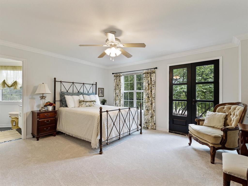 1514 New Market Road Mesquite, TX 75149 - Photo 14 of 30 a bed room with a bed and a couch