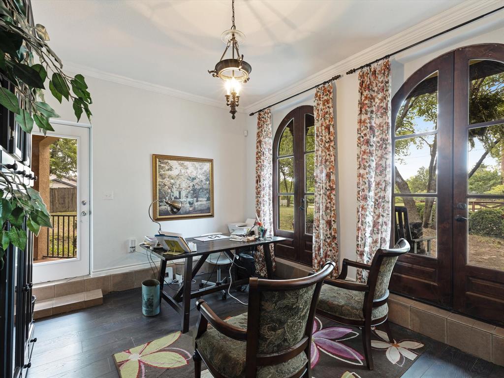 1514 New Market Road Mesquite, TX 75149 - Photo 21 of 30 a dining room with furniture a chandelier and wooden floor