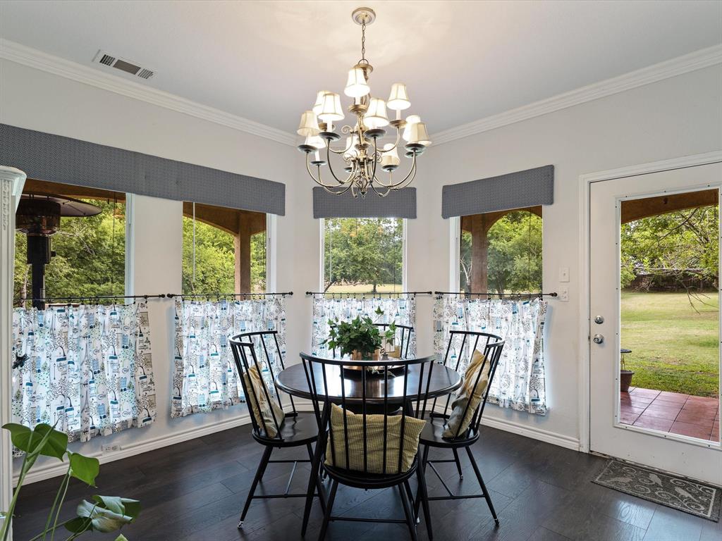 1514 New Market Road Mesquite, TX 75149 - Photo 23 of 30 a view of a dining room with furniture window and outside view