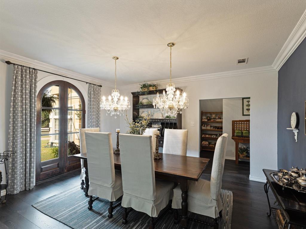1514 New Market Road Mesquite, TX 75149 - Photo 26 of 30 a view of a dining room with furniture and wooden floor