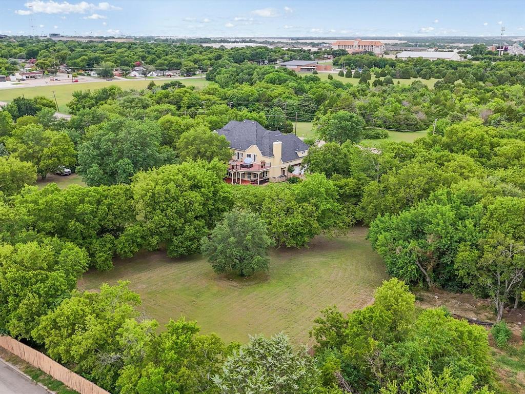 1514 New Market Road Mesquite, TX 75149 - Photo 29 of 30 an aerial view of a house with a yard