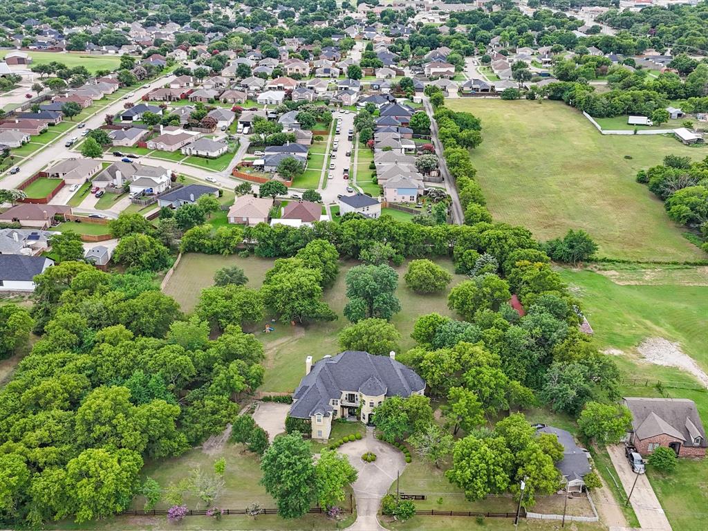 1514 New Market Road Mesquite, TX 75149 - Photo 30 of 30 an aerial view of residential houses with outdoor space and trees all around