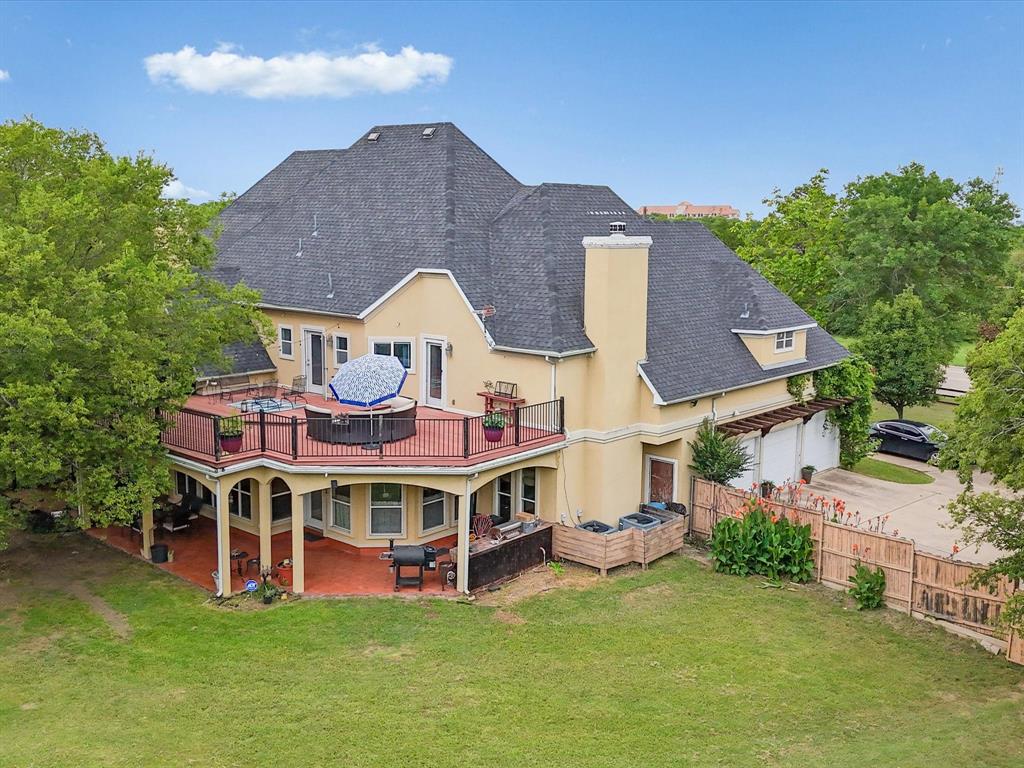 1514 New Market Road Mesquite, TX 75149 - Photo 3 of 30 a aerial view of a house with a big yard and large trees
