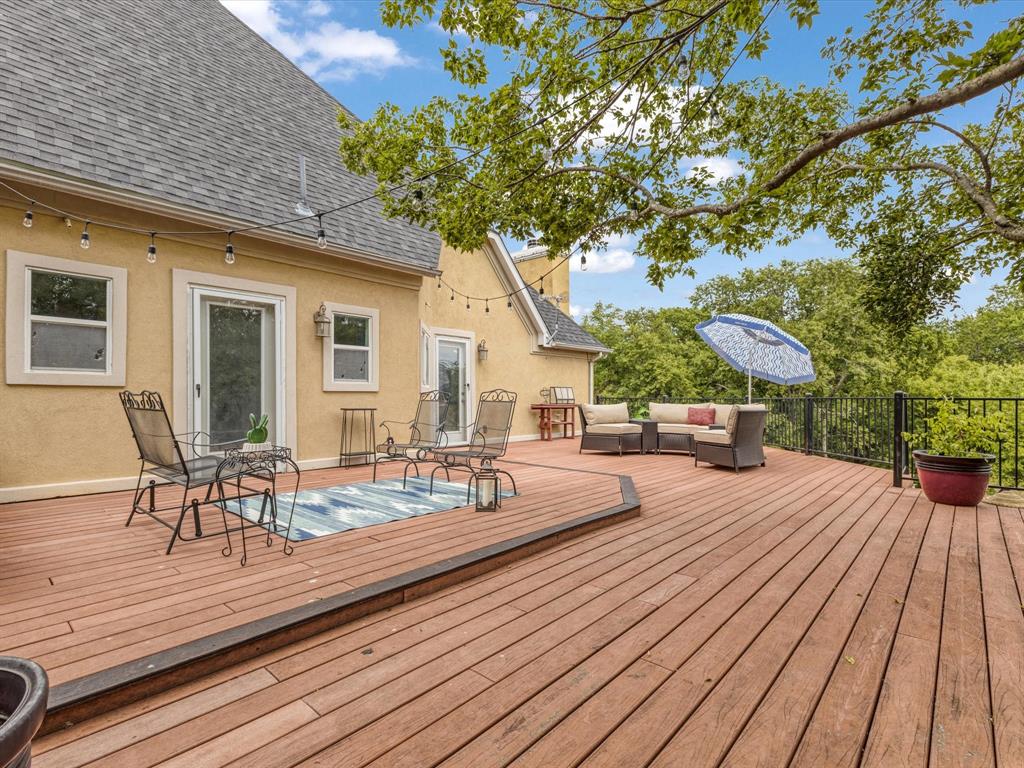 1514 New Market Road Mesquite, TX 75149 - Photo 10 of 30 a outdoor space with patio lots of furniture and wooden floor