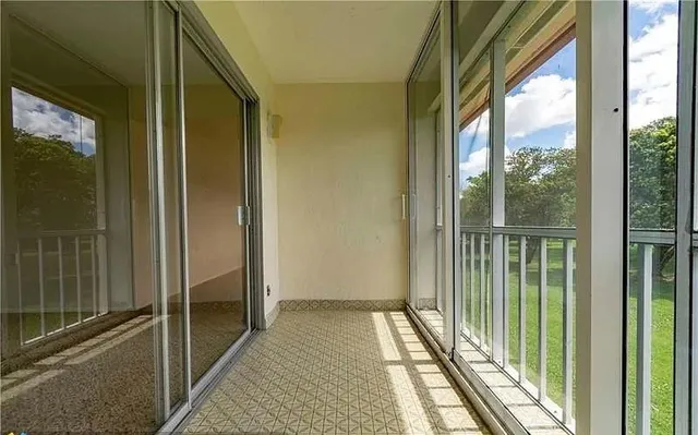 a view of a balcony from a window