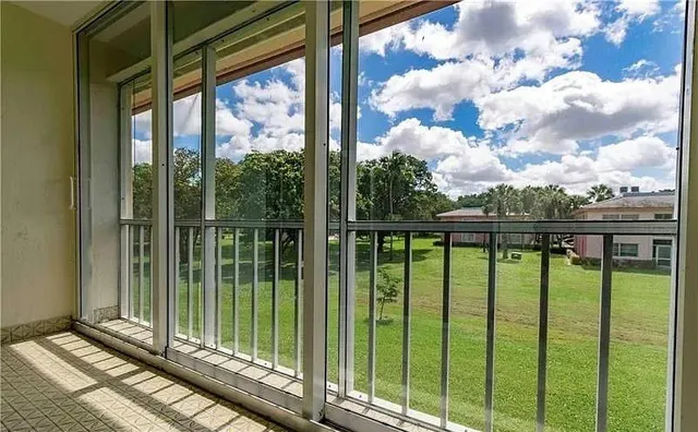 a view of a garden from a balcony