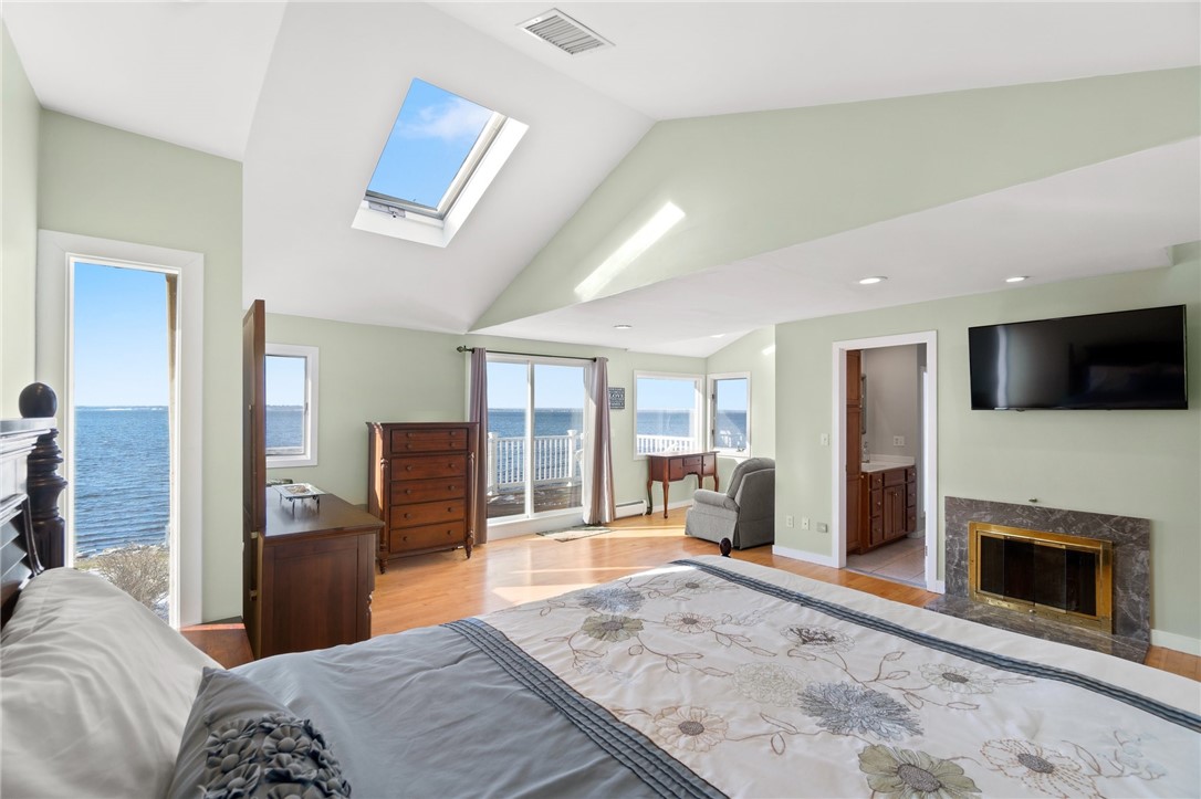 19 Brookwood Road Bristol, RI 02809 - Photo 21 of 46 Master bedroom with skylights and ocean views