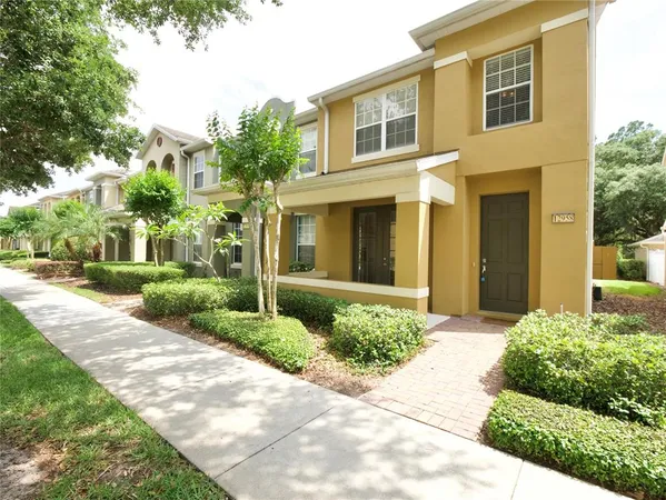 a front view of a house having yard
