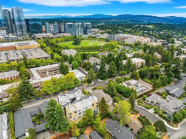 a view of a swimming pool with outdoor seating
