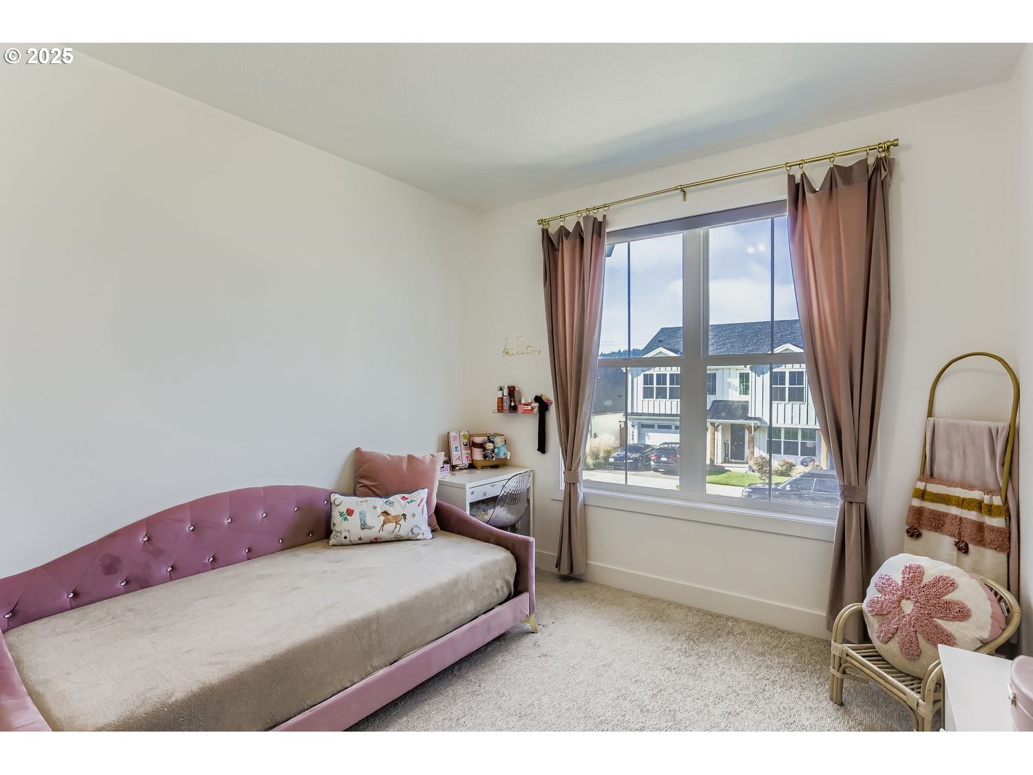 3651 Tiana Street Forest Grove, OR 97116 - Photo 20 of 27 a bedroom with a bed and large window