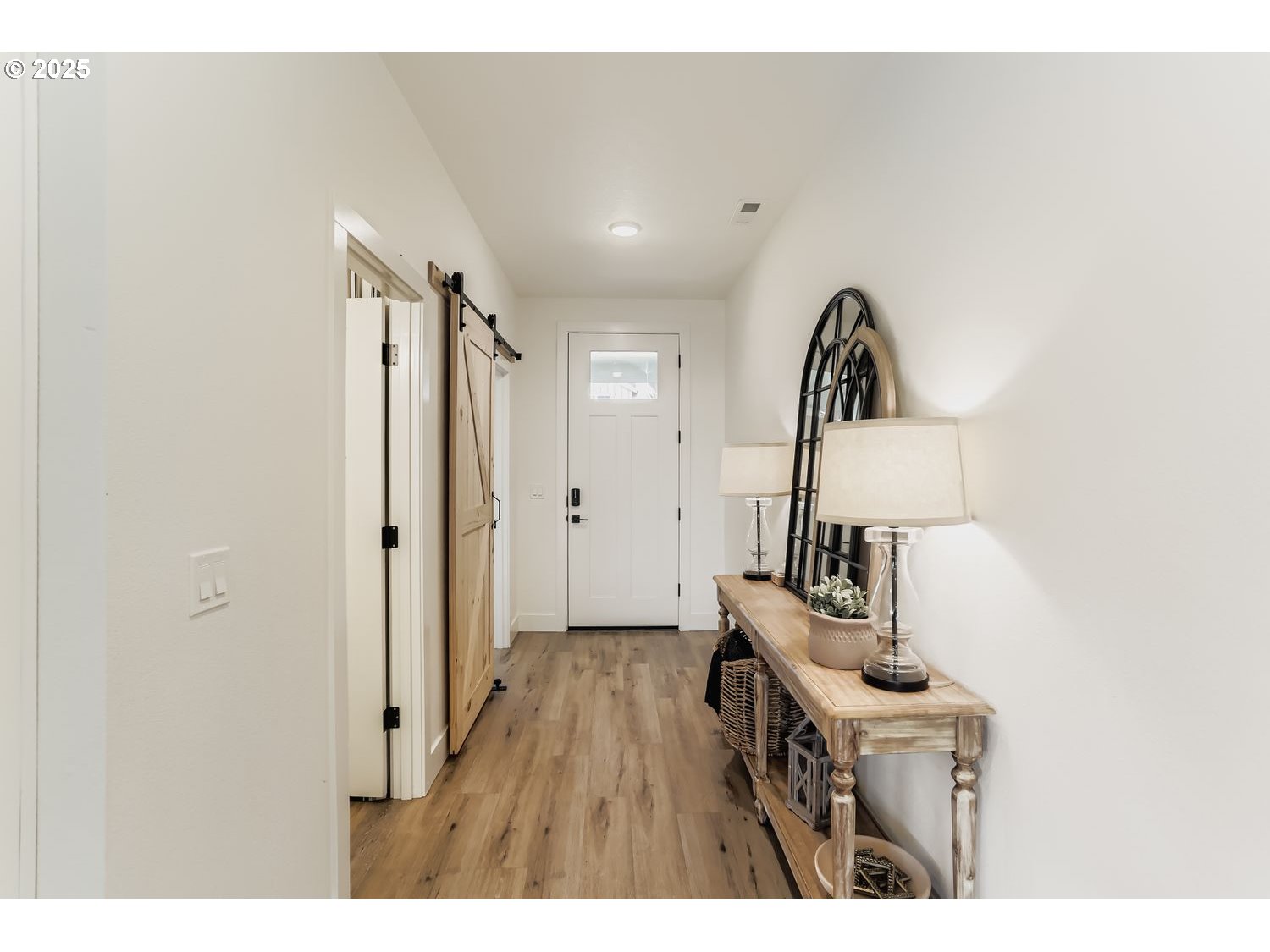 3651 Tiana Street Forest Grove, OR 97116 - Photo 5 of 27 a view of hallway with furniture and wooden floor