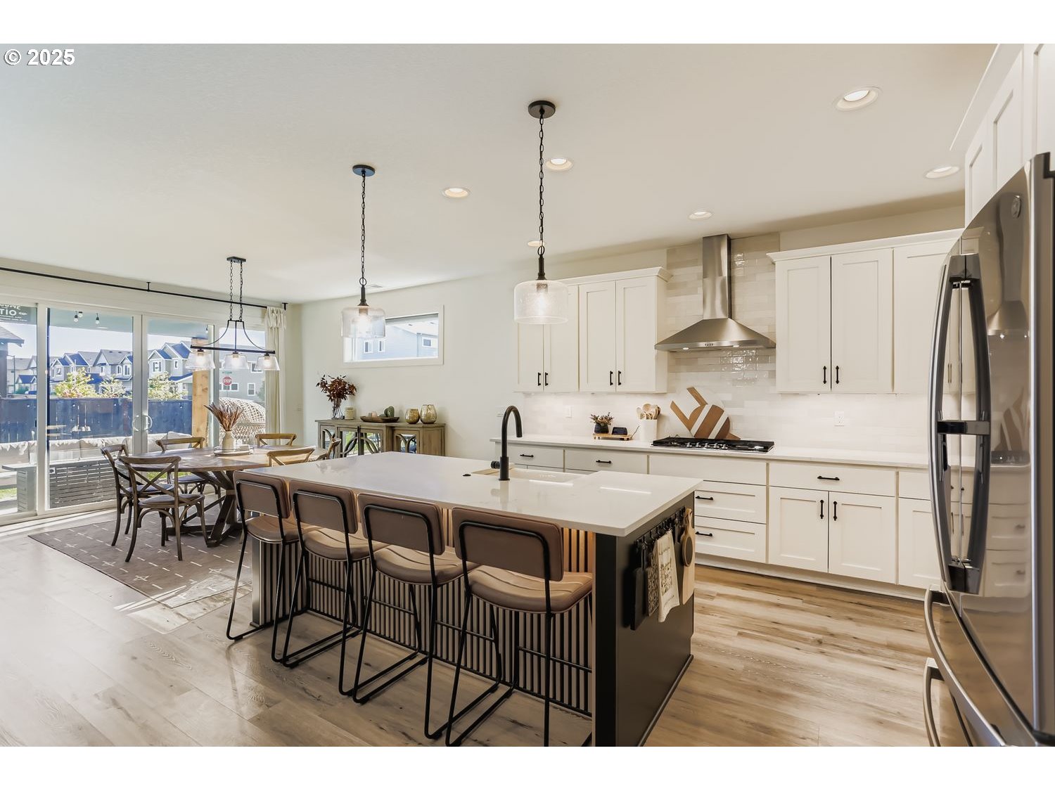 3651 Tiana Street Forest Grove, OR 97116 - Photo 10 of 27 a kitchen with appliances cabinets and a counter top space