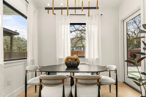 a bathroom with a double vanity sink and mirror