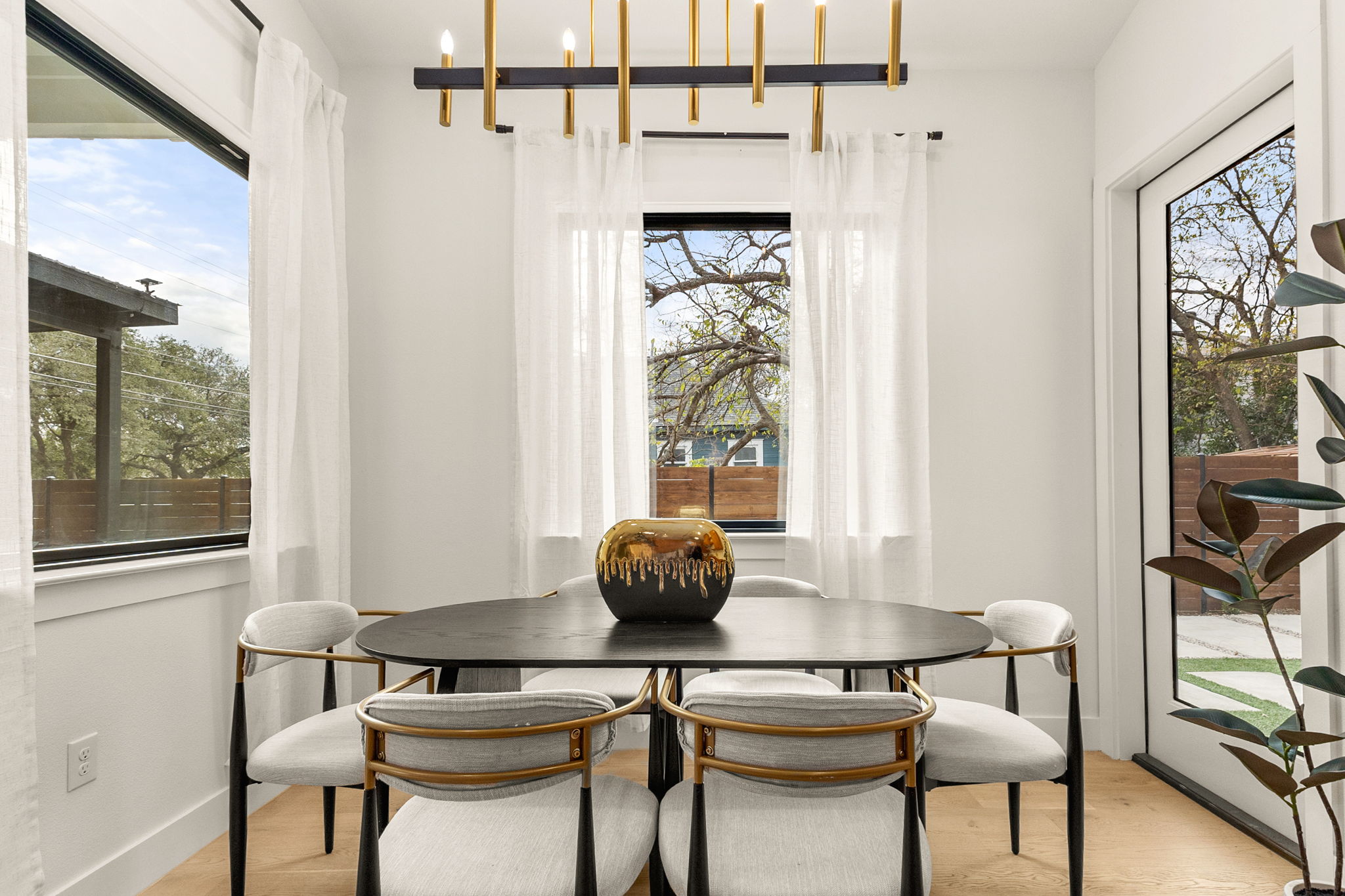 4418 Red River Street, Unit 1 Austin, TX 78751 - Photo 13 of 40 Dining area with light wood-style flooring and healthy amount of natural light