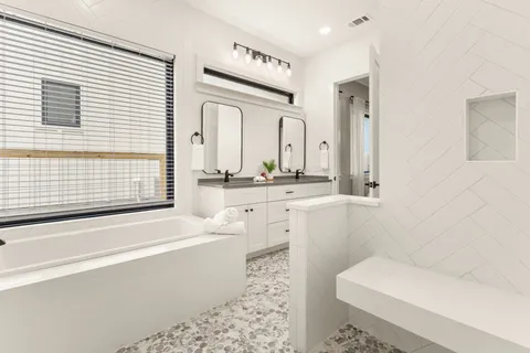 a bedroom with a bed and a view of bedroom