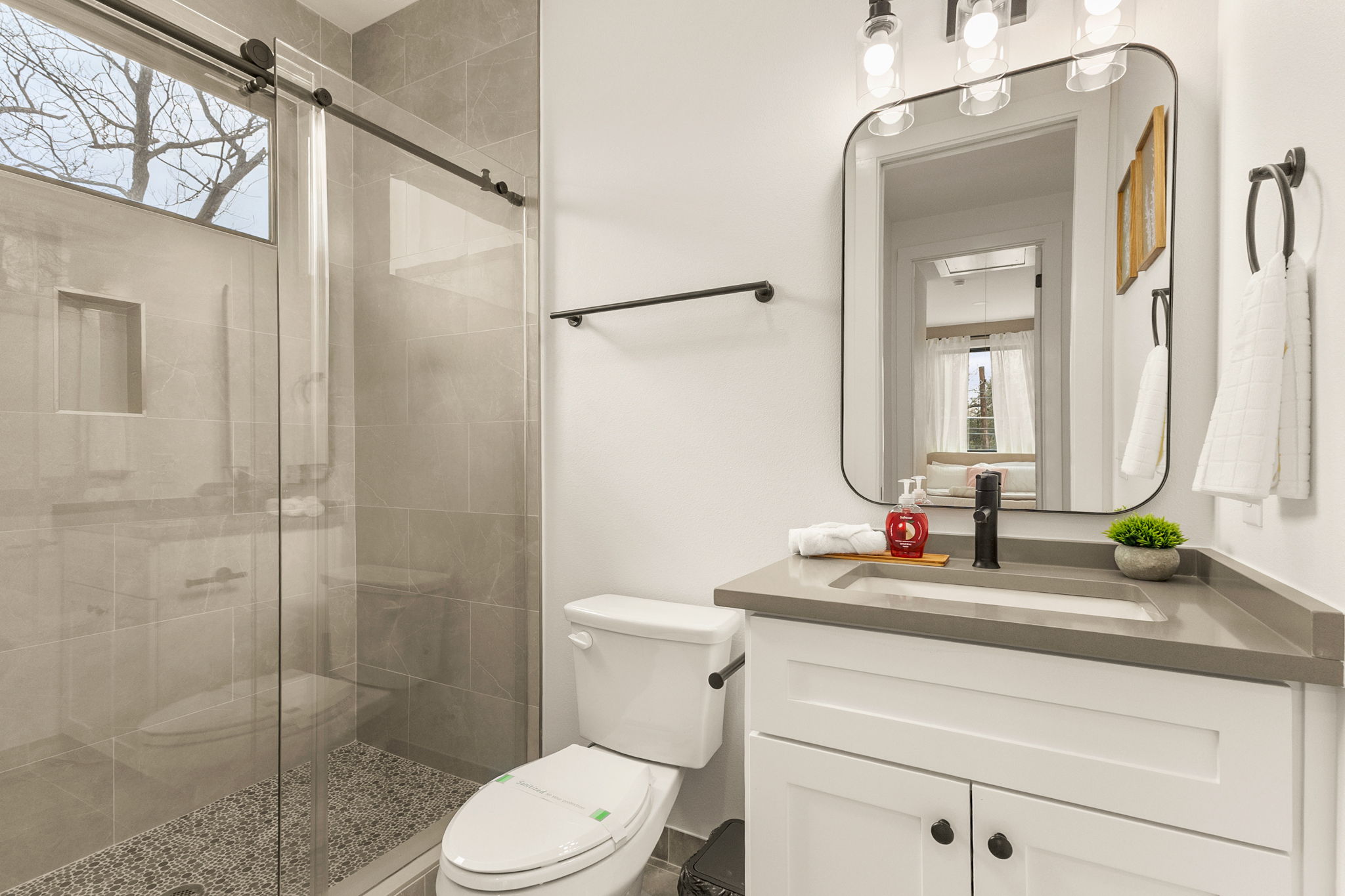 4418 Red River Street, Unit 1 Austin, TX 78751 - Photo 25 of 40 Bathroom with plenty of natural light, vanity, and a stall shower