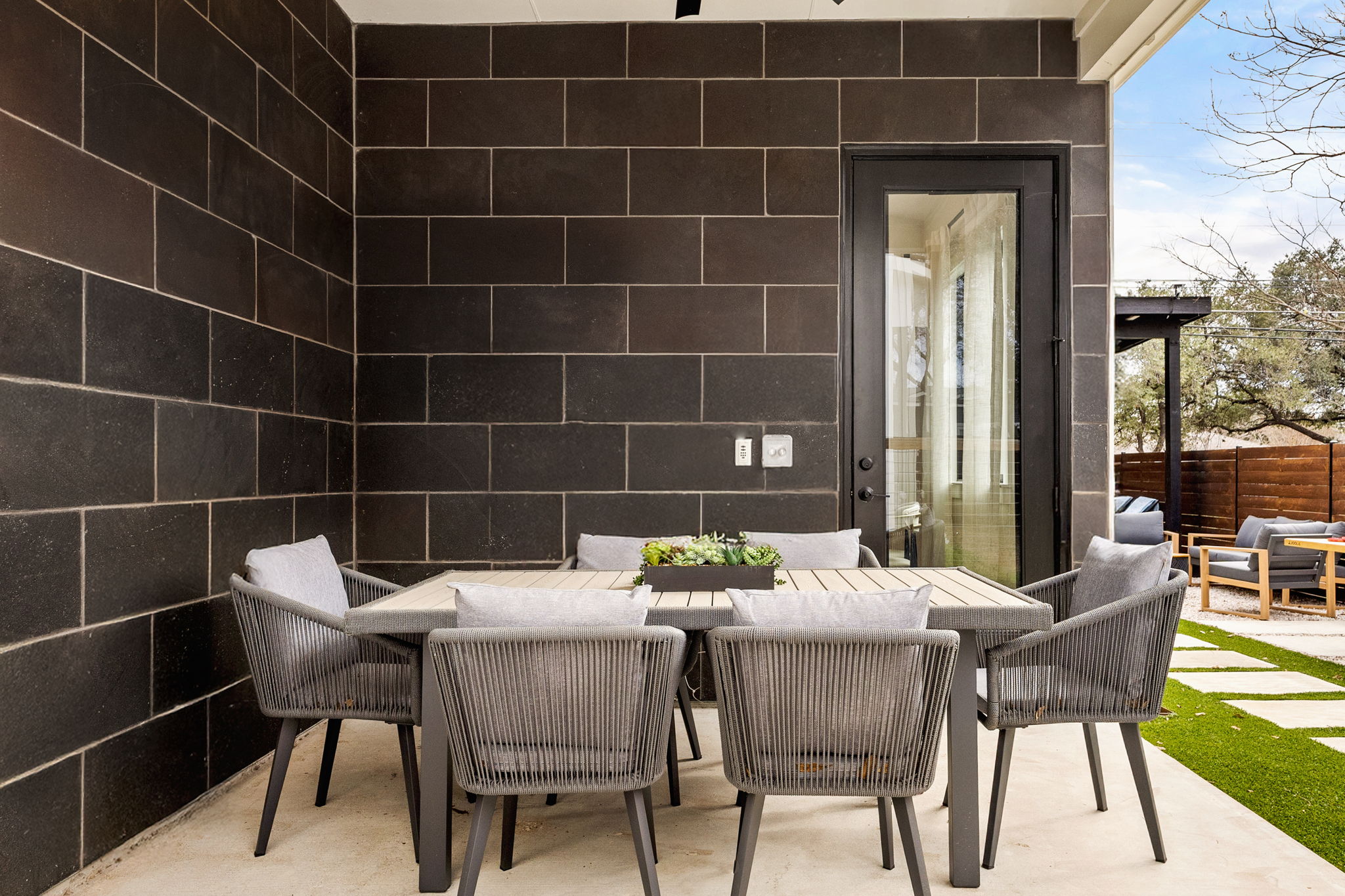 4418 Red River Street, Unit 1 Austin, TX 78751 - Photo 32 of 40 View of patio / terrace with an outdoor living / dining area