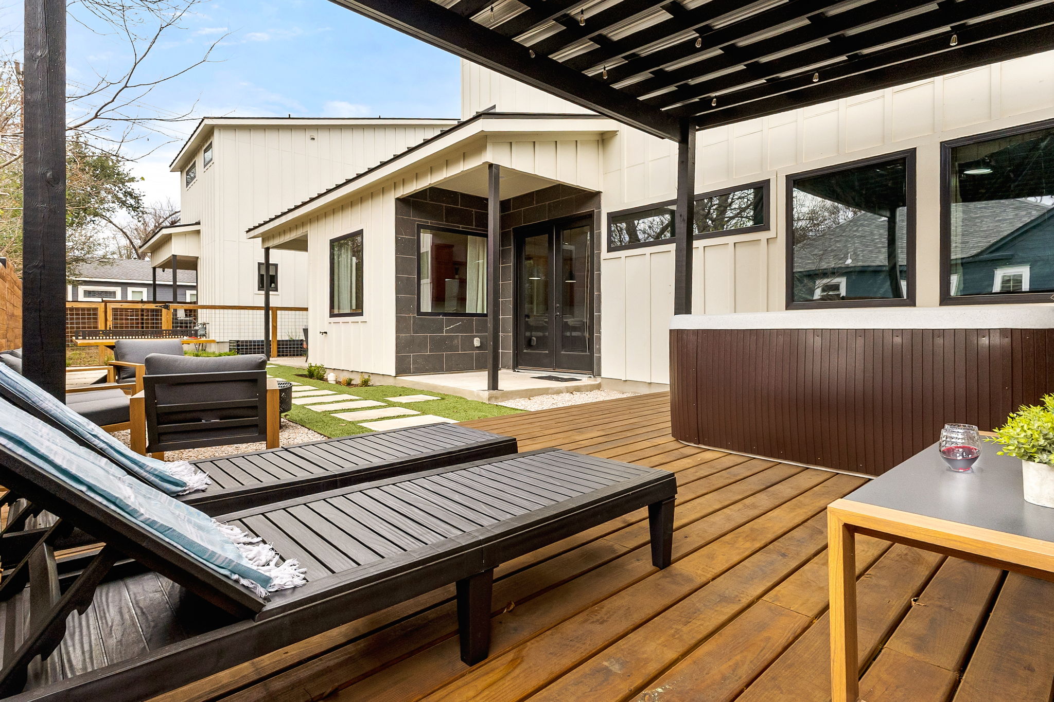 4418 Red River Street, Unit 1 Austin, TX 78751 - Photo 37 of 40 Wooden deck with a patio area, outdoor lounge area, and french doors