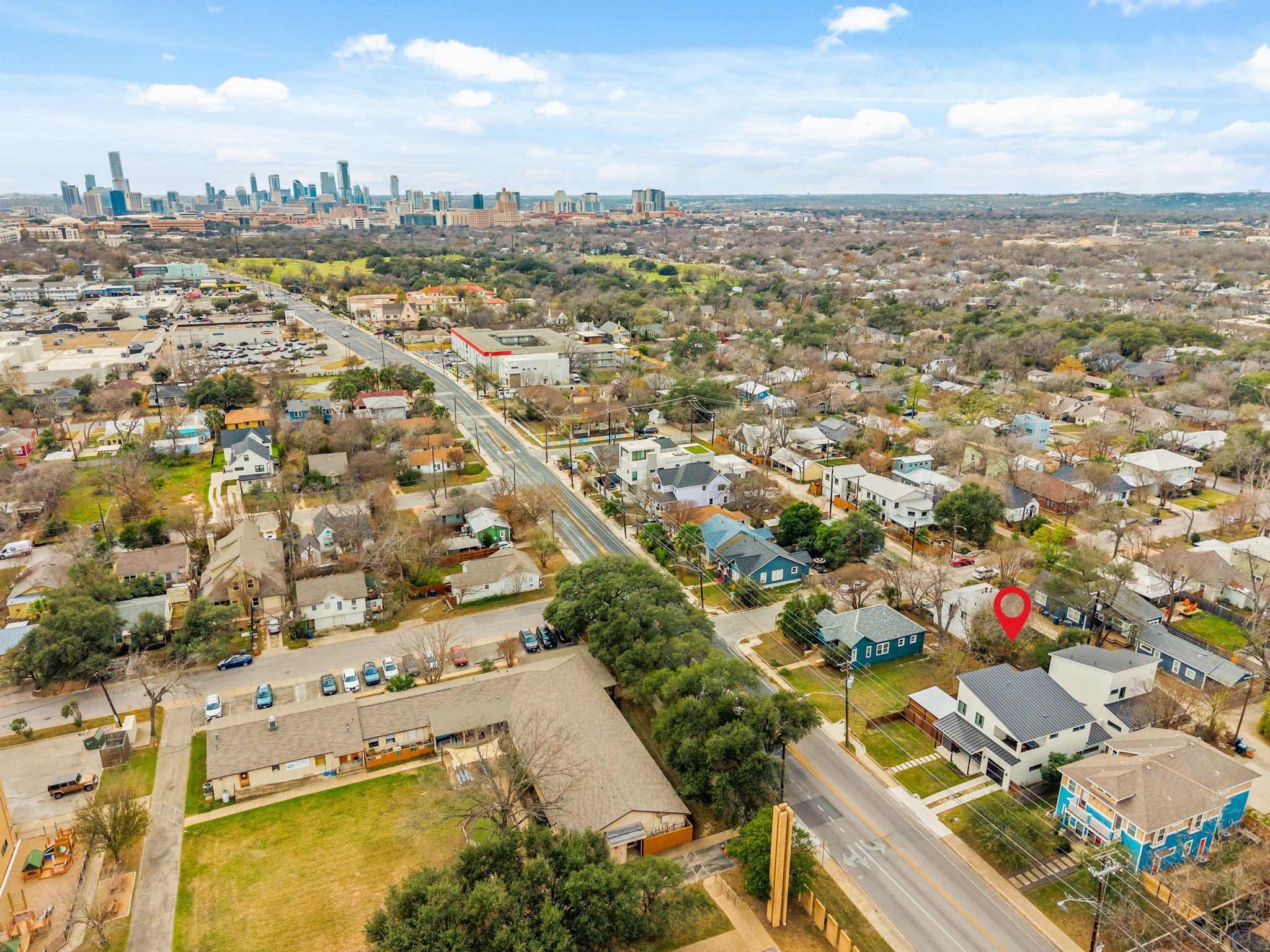 4418 Red River Street, Unit 1 Austin, TX 78751 - Photo 40 of 40 Aerial view of residential area with city skyline