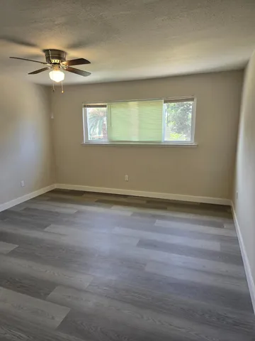 a view of a room that has a window