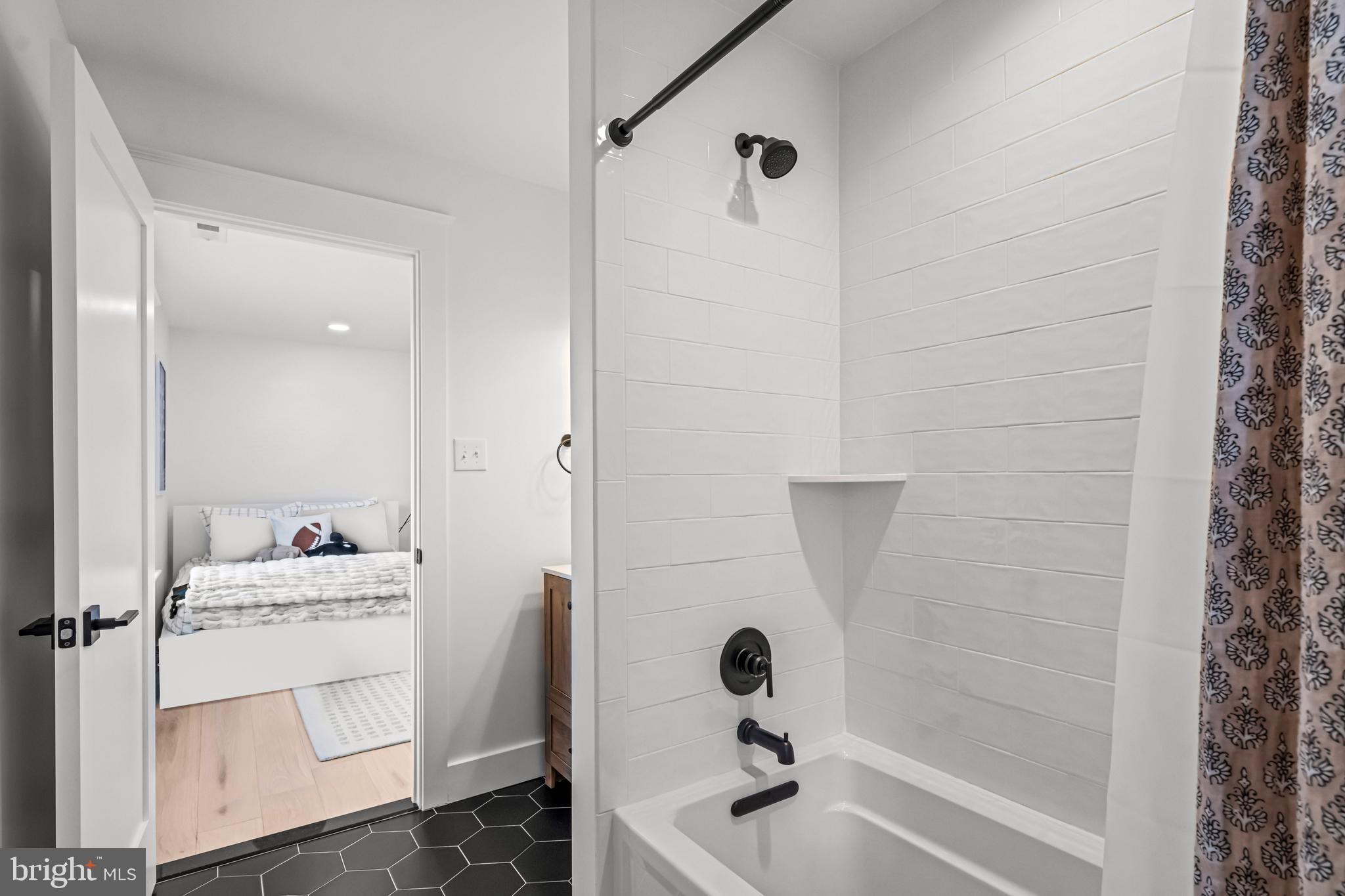 37 Estaugh Avenue Haddonfield, NJ 08033 - Photo 41 of 68 a bathroom with a sink a toilet and shower