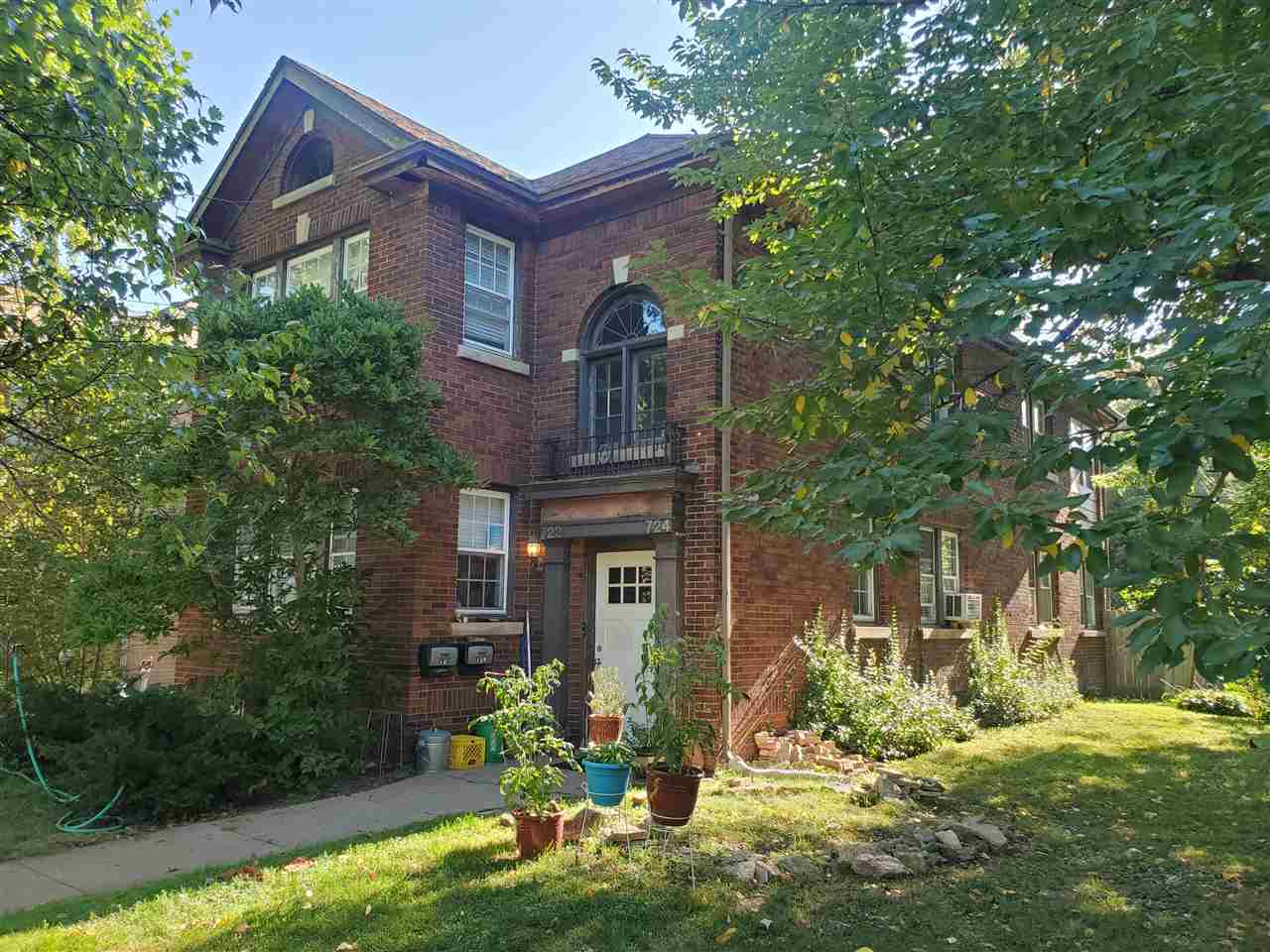 722 Seminary Street Rockford, IL 61104 - Photo 2 of 2 a front view of a house with garden