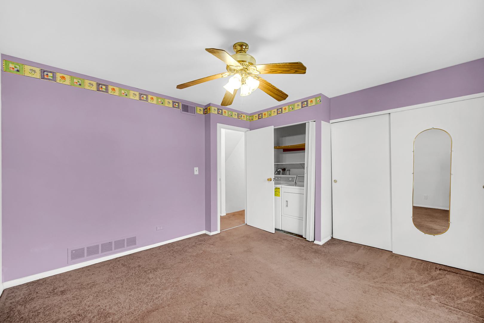 1746 Sessions Walk, Unit 1746 Hoffman Estates, IL 60169 - Photo 13 of 19 a view of a chandelier fan and a projector in a room