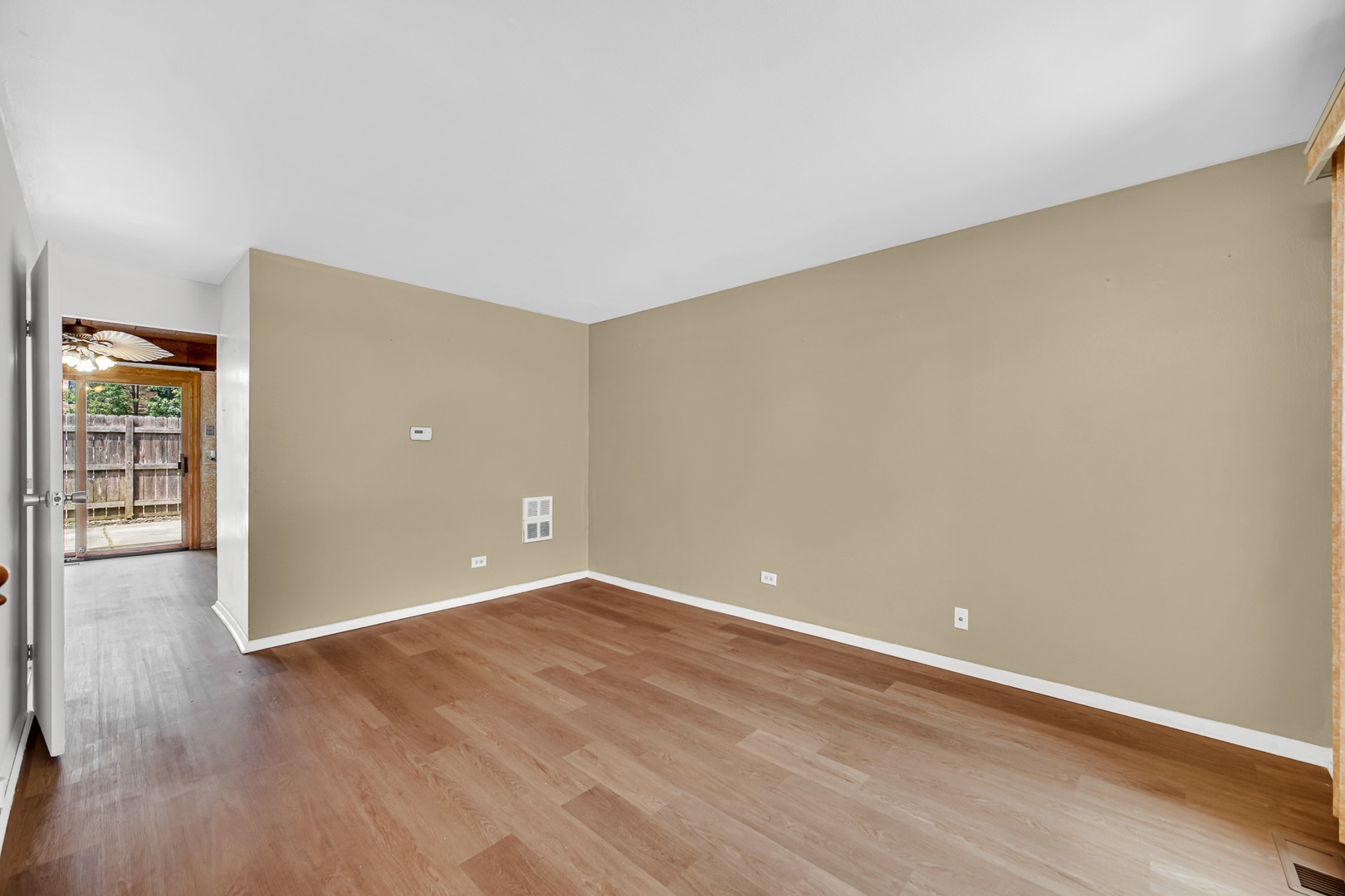1746 Sessions Walk, Unit 1746 Hoffman Estates, IL 60169 - Photo 4 of 19 wooden floor in an empty room