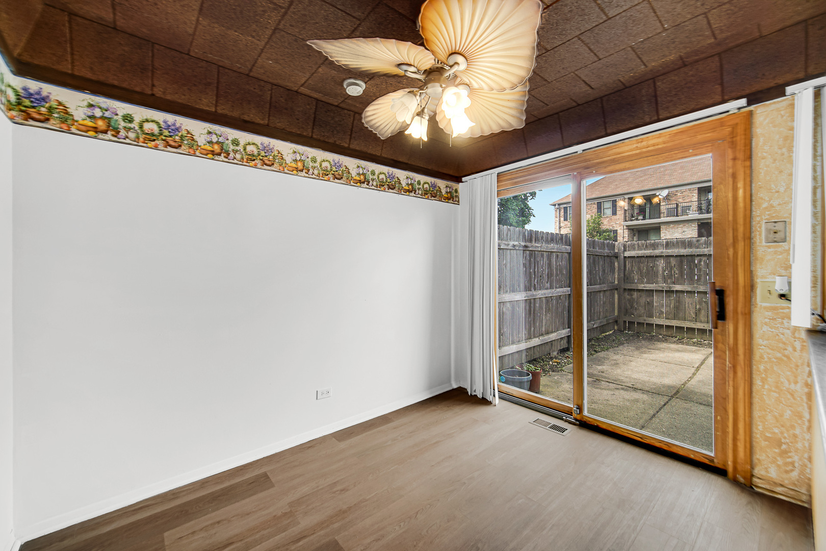 1746 Sessions Walk, Unit 1746 Hoffman Estates, IL 60169 - Photo 7 of 19 a view of an empty room with a window