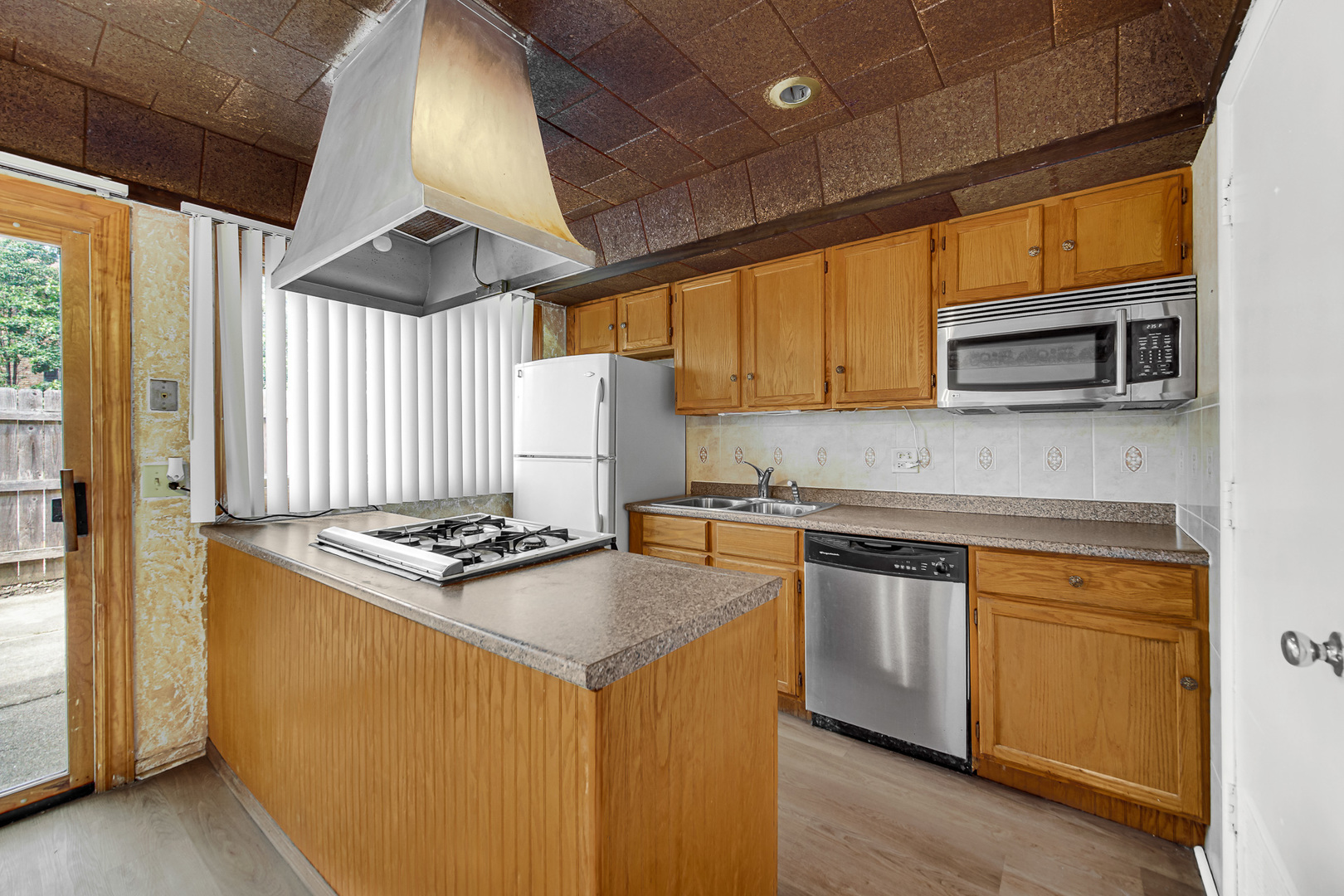 1746 Sessions Walk, Unit 1746 Hoffman Estates, IL 60169 - Photo 10 of 19 a kitchen with stainless steel appliances granite countertop a stove a sink and a microwave