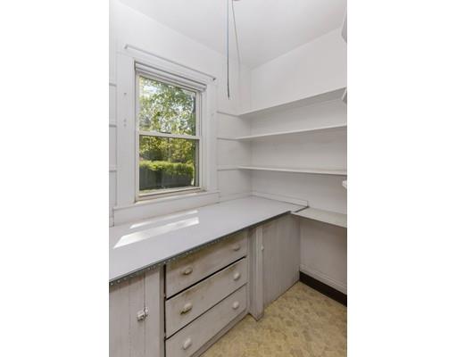 80 Barrows Street Dedham, MA 02026 - Photo 11 of 28 a kitchen with a window cabinets and a sink