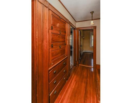 80 Barrows Street Dedham, MA 02026 - Photo 12 of 28 a view of walk in closet with clothes